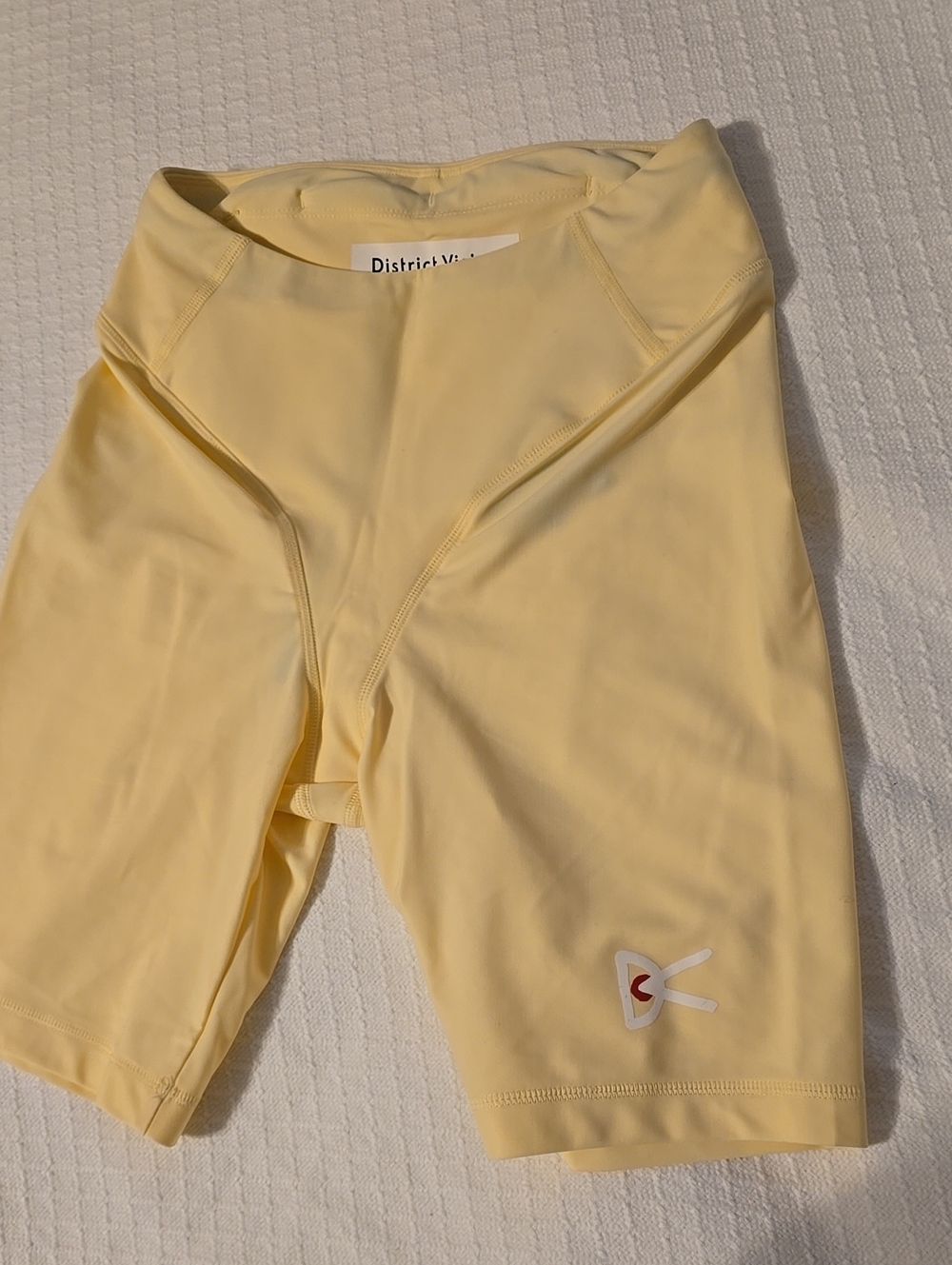 💥District Vision 7” Pocketed Half Tights Chamomile XS – $160 Retail
